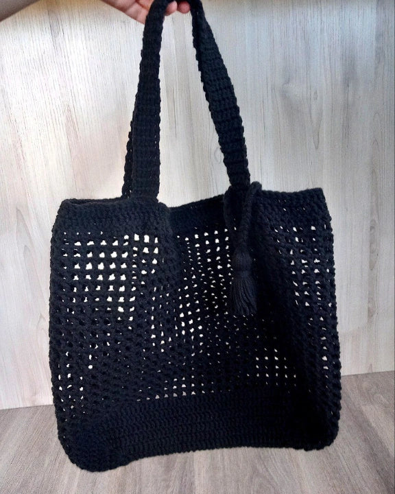 Dark crocheted bag